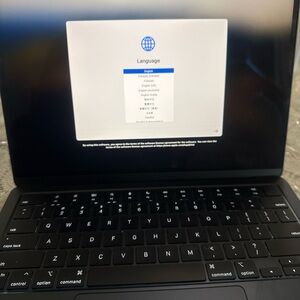 Apple Black Laptop with Chiclet Keyboard and Widescreen Display